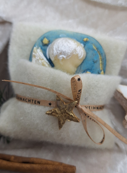 Engelkinder im Wollbettchen